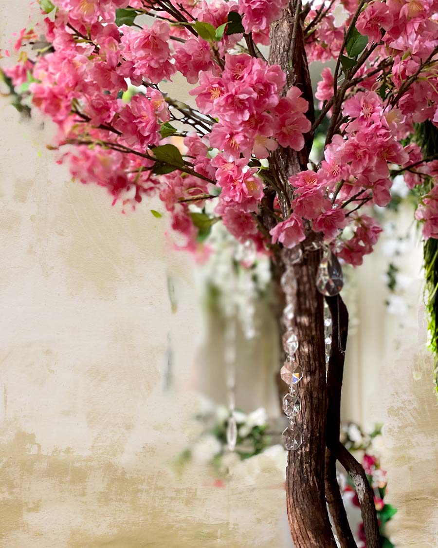 Silk tree with pink petals for event decoration